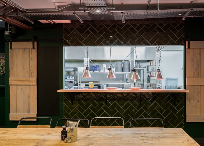 Web-4.-Rear-kitchen-with-theatrical,-open-pass